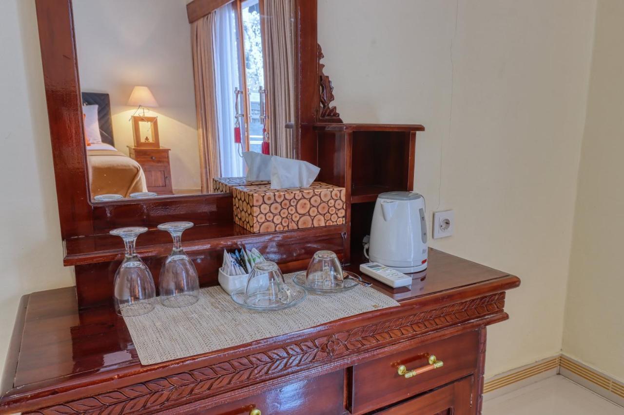 Nibugi Guest House Toyapakeh Buitenkant foto